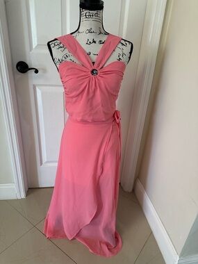 Fashion Nova Pink Twist Front Top and wrap Skirt with lining underneath skirt.